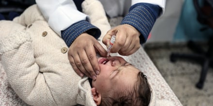 A doctor delivers polio and rotavirus vaccination